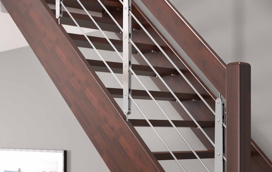 Balustrada MIKRON - idealna balustrada do klasycznych, drewnianych modeli schodów Rintal. Pionowe tralki, wykonane z metalowych płaskowników montuje się do drewnianych policzków schodów.